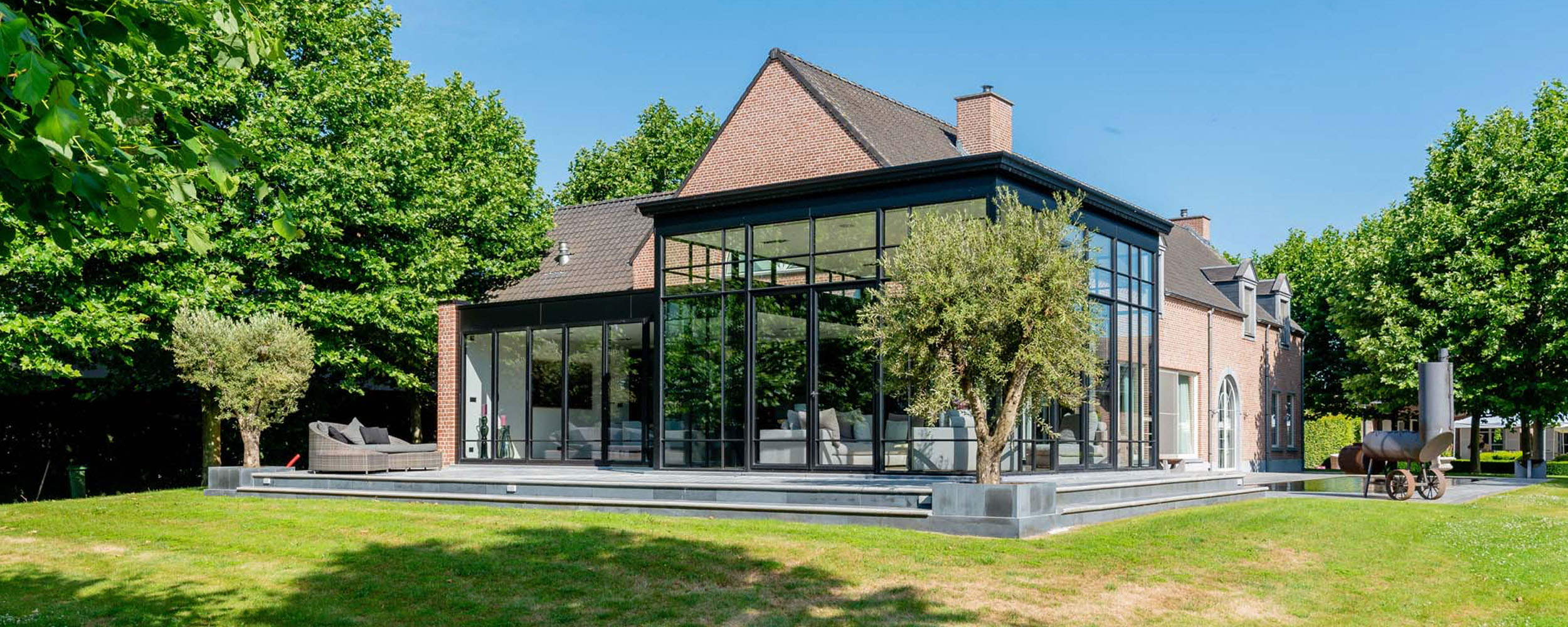 Aluminium vouwwand met steellook ramen in Dendermonde